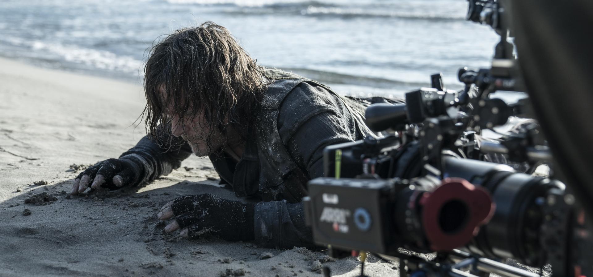 A BTS image of Norman Reedus on the shores of Provence